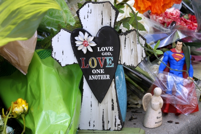 Items left on a makeshift memorial are seen at Our Lady of the Lake Regional Medical Center in Baton Rouge, Louisiana, U.S., July 18, 2016.