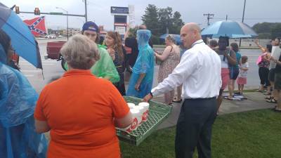 The owner and employees of a Johnson City, Tenn. Chick-fil-A restaurant serve lemonade to Black Lives Matter protesters and their opposition outside of the restaurant. July 16, 2016.