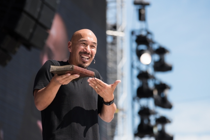 Francis Chan addresses thousands of Christians gathered on the National Mall in Washington, D.c. for Together 2016 on July 16, 2016.