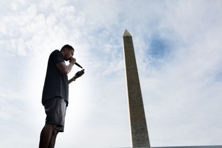 Rapper Lecrae hit the stage at Together 2016 and led thousands in a prayer, July 16, 2016.