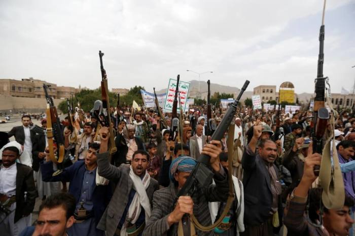 Houthi followers shout slogans during a demonstration against Saudi-led airstrikes in Sanaa, Yemen, July 18, 2016.
