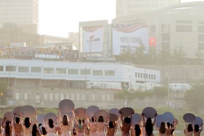 Women pose nude for photographer Spencer Tunick's art installation 'Everything She Says Means Everything' near the location of the Republican National Convention in Cleveland, Ohio, U.S., July 17, 2016.