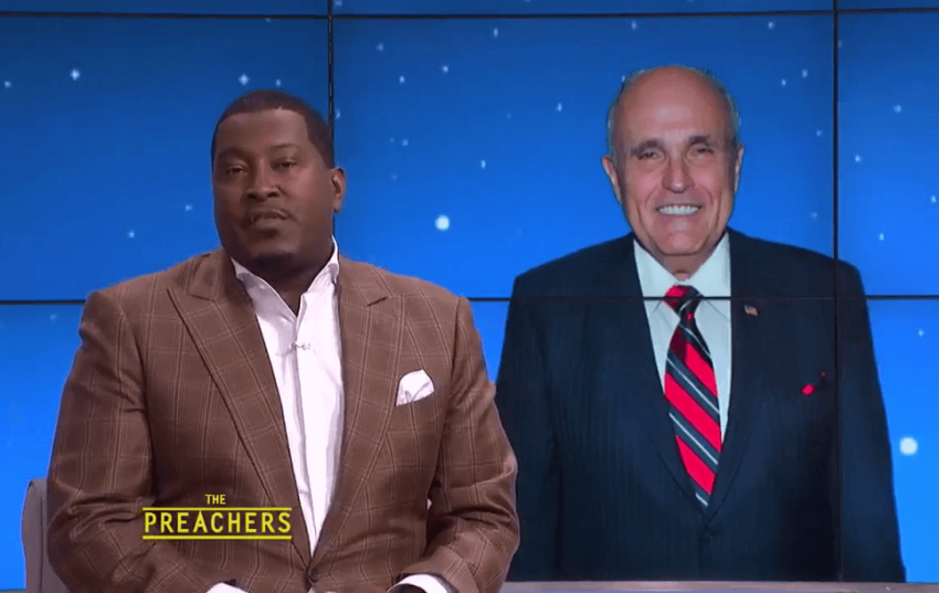 E. Dewey Smith Jr., senior pastor of The House of Hope Atlanta (Greater Travelers Rest) church in Decatur, Georgia (L) and former New York City Mayor, Rudy Giuliani (R).