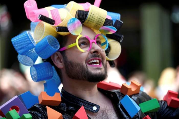 A participant takes part in the annual Pride London Parade which highlights issues of the gay, lesbian and transgender community, in London, Britain, June 25, 2016.