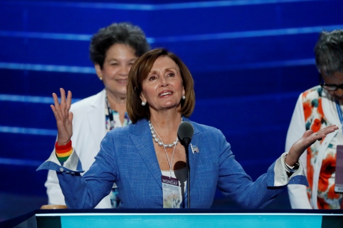 U.S. House Minority Leader Nancy Pelosi (D-CA) stands at the podium during her walk through on the stage ahead of the 2016 Democratic National Convention in Philadelphia, Pennsylvania, U.S. July 25, 2016.