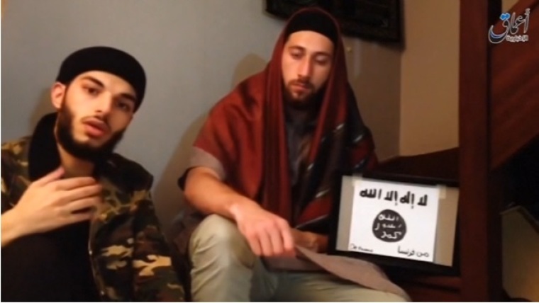 Adel Kermiche (L) and Abdel-Malik Nabil Petitjean (R) purportedly appear in a video to pledge allegiance to the Islamic State. The video was released on July 27, 2016 by the terror group.