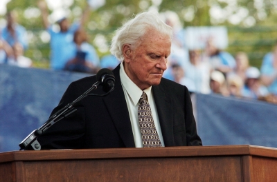 Evangelist Billy Graham speaks during the final day of his Crusade at Flushing Meadows Park in New York June 26, 2005. Graham, 86, has preached the Gospel to more people in a live audience format than anyone in history -- over 210 million people in more than 185 countries. His followers believe that the New York Crusade which runs from June 24 to 26 will be his last live appearance.