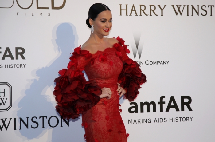 Singer Katy Perry poses during a photocall as she arrives to attend the amfAR's Cinema Against AIDS 2016 event, during the 69th Cannes Film Festival, in Antibes, France, May 19, 2016.