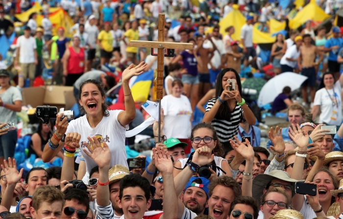 The faithful greet Pope Francis as he arrives to the Campus Misericordiae during World Youth Day in Brzegi near Krakow, Poland on July 31, 2016.