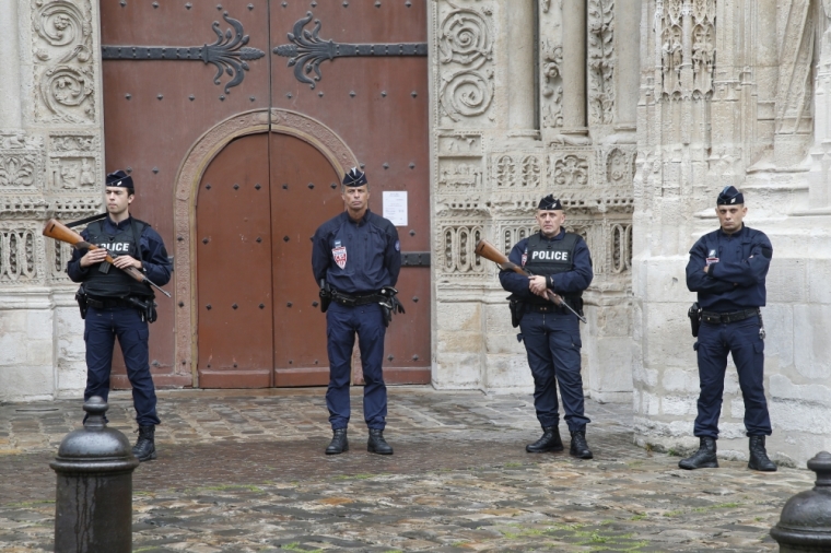 Armed French police take position outside the Cathedral in Rouen, France, during a funeral service in memory of slain French parish priest Father Jacques Hamel at the Cathedral in Rouen, France, August 2, 2016. Father Jacques Hamel was killed last week in an attack on a church at Saint-Etienne-du-Rouvray near Rouen that was carried out by assailants linked to Islamic State.