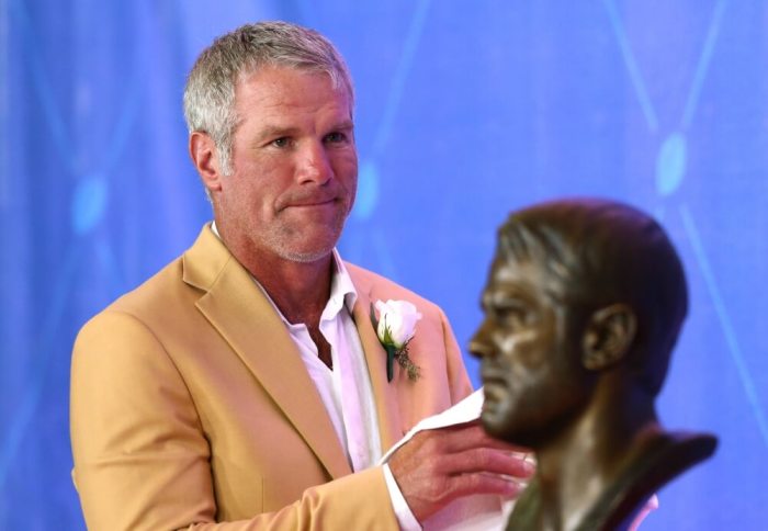 Former Green Bay quarterback Brett Favre looks on after giving his acceptance speech during the 2016 NFL Hall of Fame enshrinement at Tom Benson Hall of Fame Stadium.