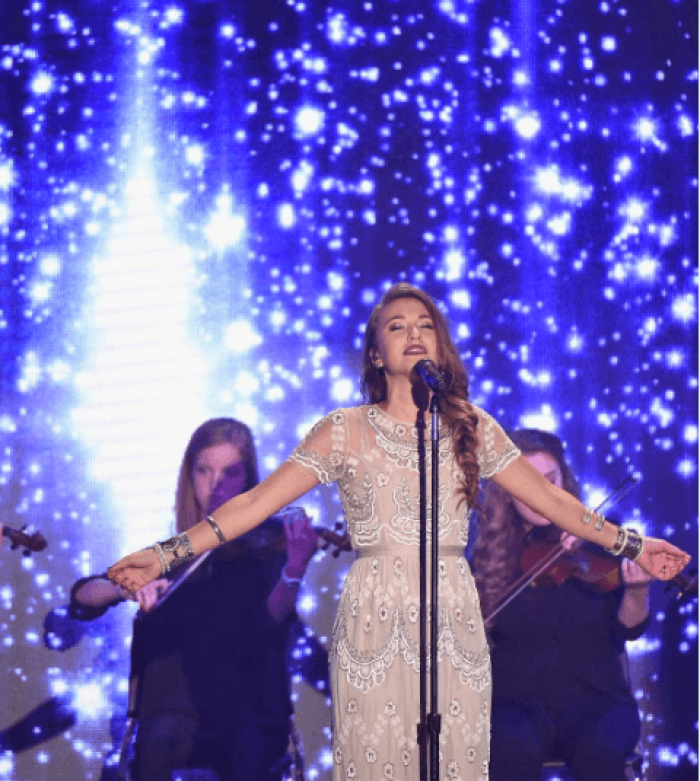 Lauren Daigle performs at the 46th Annual GMA Dove Awards, 2015.