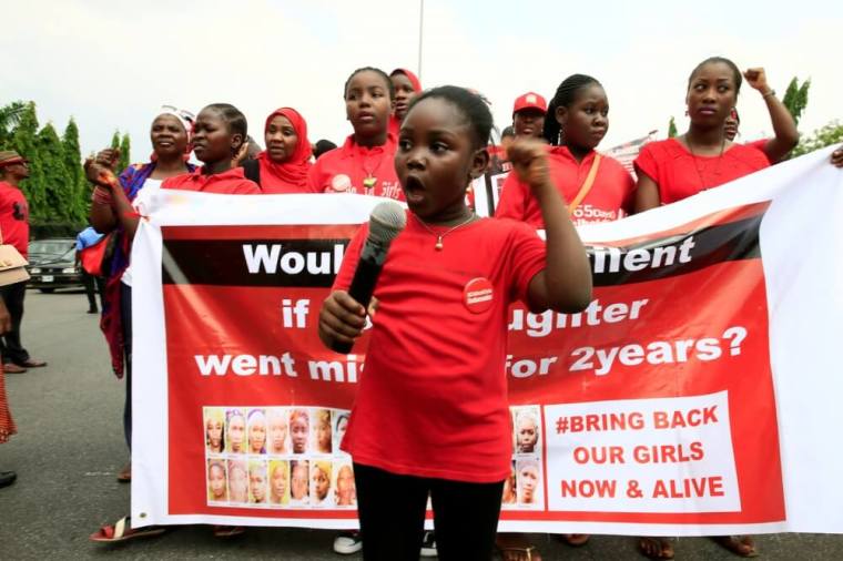 'Bring Back Our Girls' campaigner Christabell Ibrahim, 8, speaks during the media conference marking two years from the abduction of the Chibok girls, in Abuja, Nigeria, April 14, 2016.