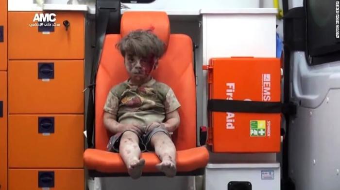 Five-year-old Omran Daqneesh was injured late on Wednesday in a military strike on the rebel-held Qaterji neighborhood in Syria. The image is a still from a video filmed and circulated by the Aleppo Media Centre, August 18, 2016.