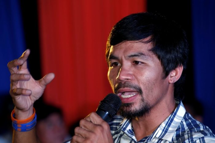 Filipino boxer Manny Pacquiao and Senatorial candidate for May 2016 national elections speaks to his supporters during election campaigning in San Pablo, Laguna in the Philippines, April 28, 2016.
