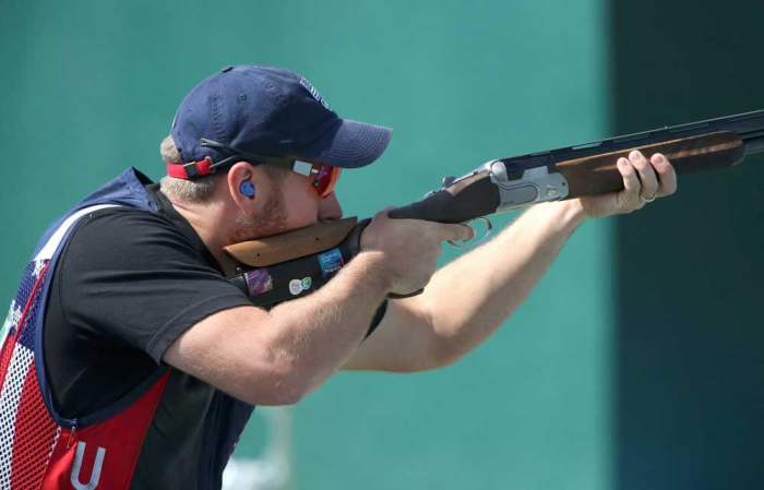 Vincent Hancock of USA competes in the preliminary men's skeet qualification at the Olympic Shooting Center in Rio de Janeiro, Brazil on August 13, 2016.
