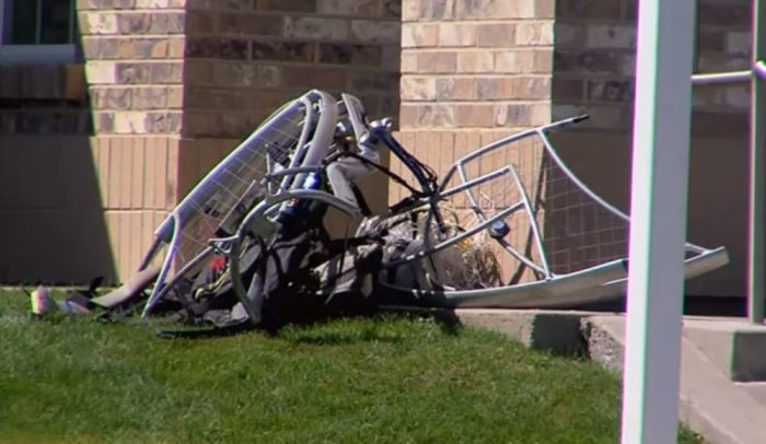 The remains of Jim Petersen's paraglider lay on the grounds of the Church of Jesus Christ of Latter-day Saints chapel in Draper, Utah on Aug. 21, 2016.