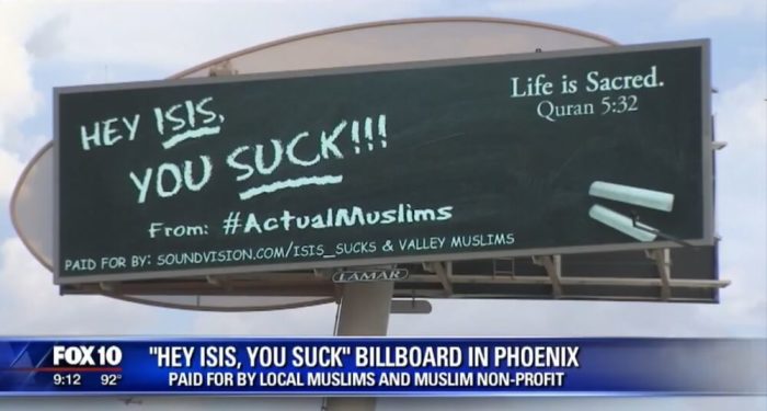 A large electronic billboard has a simple message directed at ISIS: 'Hey ISIS, you suck,' erected in Phoenix in August 2016.