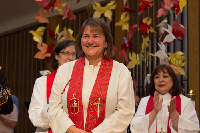 Karen Oliveto, the first openly gay bishop in the history of the United Methodist Church, at her consecration service July 16, 2016, at Paradise Valley United Methodist Church in Scottsdale, Arizona.
