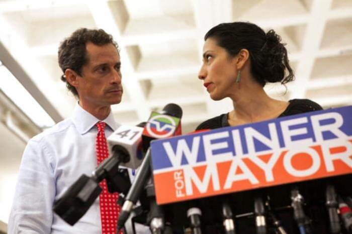 Former New York mayoral candidate Anthony Weiner and his wife Huma Abedin attend a news conference in New York, July 23, 2013.