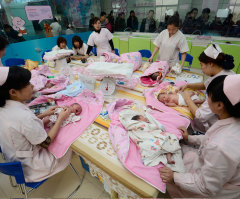 Chinese Officials Reviewing Controversial One-Child Policy; Changes Discussed