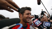 Tebow Tells Locker Room Cameraman, 'Jesus Loves You'