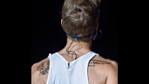 Justin Bieber New Tattoo 2013: Bible's Psalm 119:105 - 'Your Word Is a Lamp for My Feet' (PHOTO)
