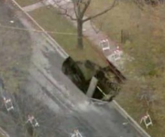 Chicago Sinkhole: Road Swallowed Up After Water Mains Leak (Photo)