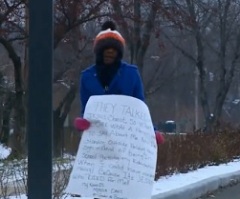 Teen Forced to Stand on Street Corner Holding Jesus Sign as Punishment After Being Suspended for Fighting at School