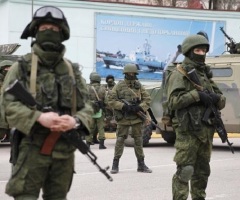 Russia Military Takes Control of Ukraine Peninsula; Britain Calls Crisis 'Biggest in 21st Century'