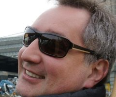 Putin Signs Treaty to Annex Crimea; Russia's Deputy PM Laughs at Obama's Sanctions