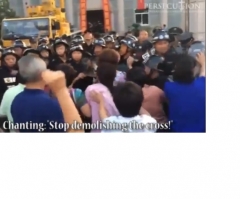 Video Shows Chinese Christians Fighting Police to Save Church Cross