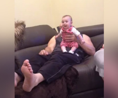 When the Dog Barks at This Baby, the Baby Barks Back! (VIDEO)