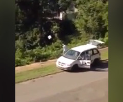 Watch an Alabama Postal Worker Throw Packages Into a Ravine (VIDEO)