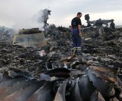 Officials Say Malaysia Flight MH17 Was Shot Down With Russian-Made Missile; Recordings Suggest Hit May Have Been Awful Mistake