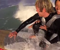 Paraplegic Mother Surfs the Waves While Duct-Taped to Her Friend – A Must-See! (VIDEO)