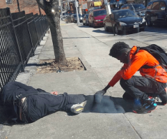 Photo of Teen Praying Over Homeless Man in Baltimore Goes Viral