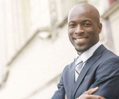 Chicago Pastor Who Stormed Trump Rally Stage Says He's Now Receiving Death Threats