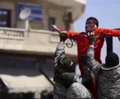 ISIS Parades Dead Bodies of Iraqi Soldiers in Front of Children in Mosul 