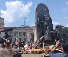 Satanic Temple Unveils Giant Goat-Headed Statue as Christians Protest at Arkansas Capitol