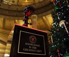  Catholics protest satanic display 'mocking Christ's Nativity' at Illinois capitol