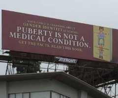 'Puberty is not a medical condition' billboard unveiled in Los Angeles; push for other cities starts