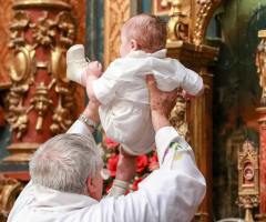 Romanian Orthodox Church's full-immersion baptism ritual under fire after infant dies