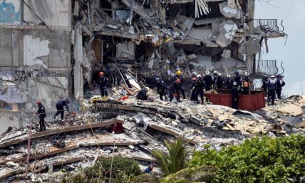 Search teams at Florida condo collapse refuse to leave after mission switches from rescue to recovery