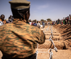 At least 100 killed in Burkina Faso massacre as militants go 'shop to shop' killing men