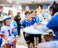 Students-athletes give their lives to Christ at event with Damar Hamlin, Buffalo Bills players