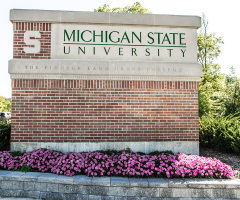 Michigan State apologizes for Hitler image shown before football game, suspends employee