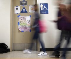 Trans student sues school district for not allowing him into the girls' bathroom