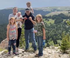 Mother shoots self, 4 daughters in head; father asks world to pray for lone survivor