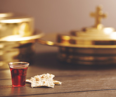 Female pastor faces backlash for draping ‘un-Christian emblem’ over Communion table